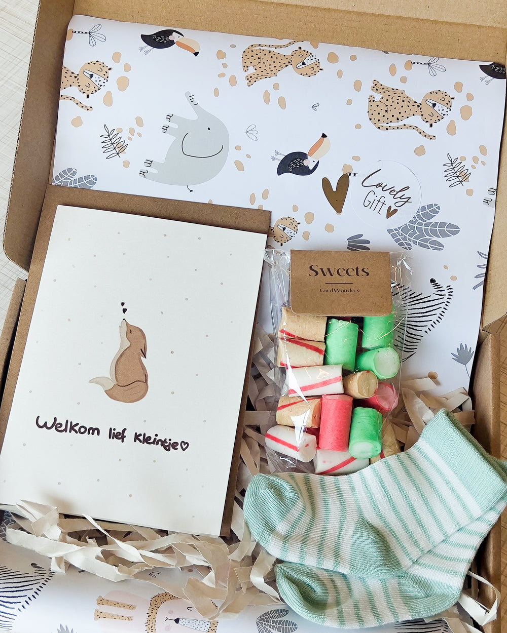 felicitatie geboorte baby cadeautje sturen sokjes vosje brievenbuscadeautje kado vosje nieuwe ouders