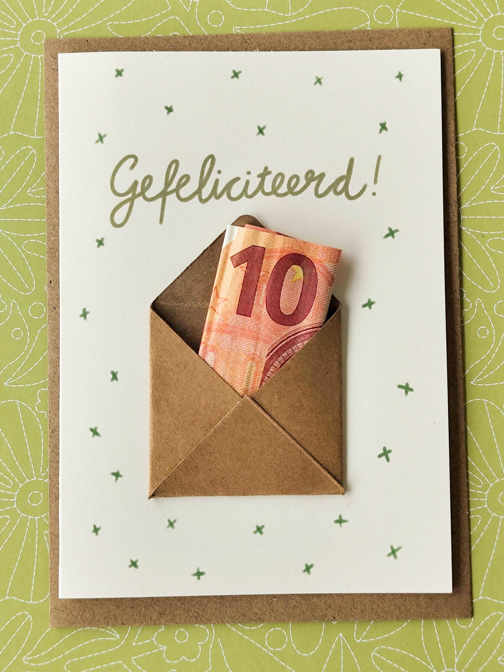 wenskaart met geldenvelop